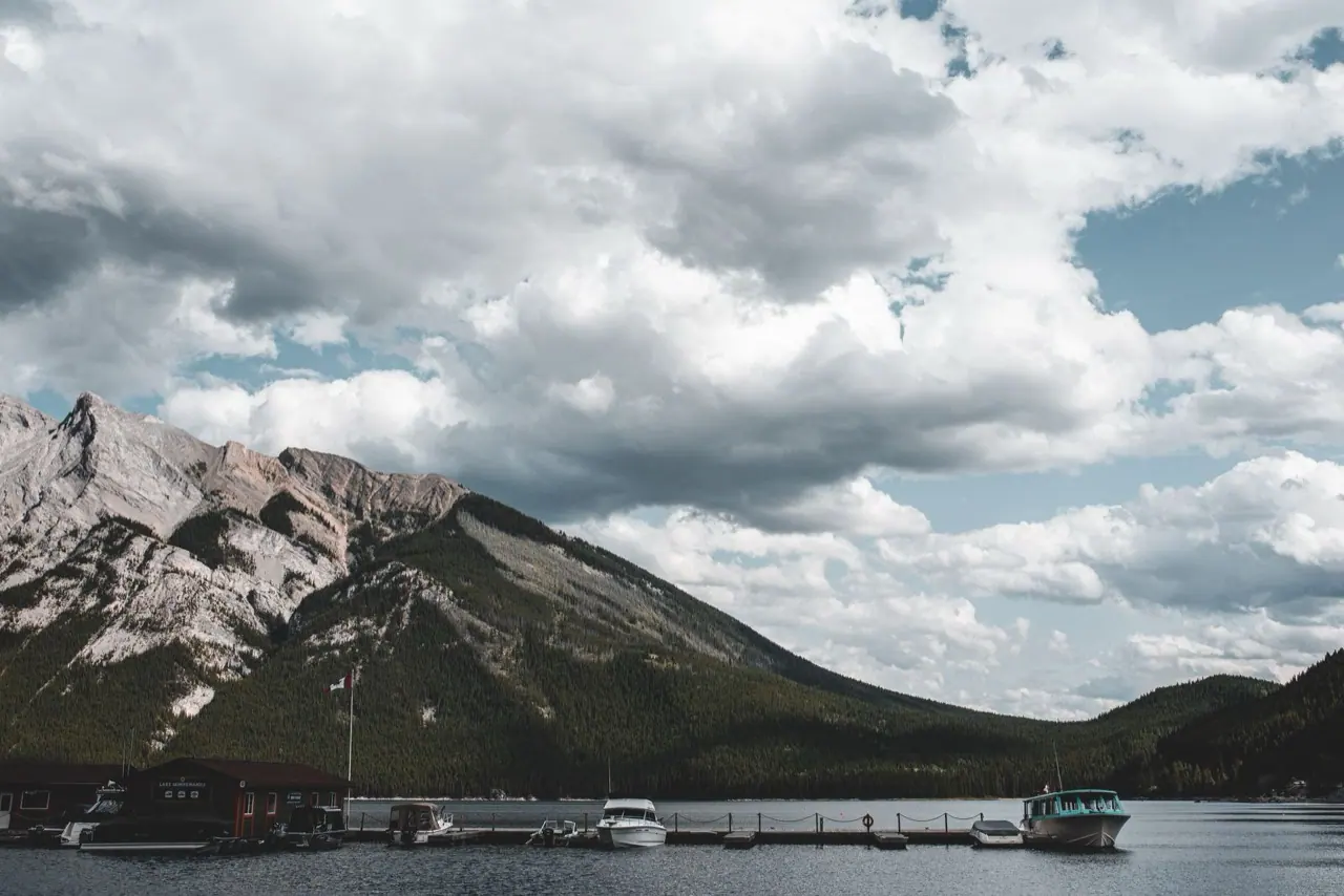 Boats at a dock on a mountain lake in western Canada